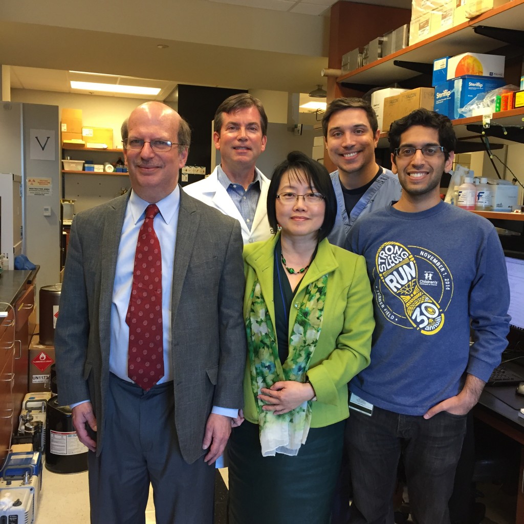 Researchers from the Brain Imaging Group met with Dr. Lawrence Kleinberg (left), a radiation oncologist at Johns Hopkins and chairman of the Brain Tumor Working Group of ECOG-ACRIN.